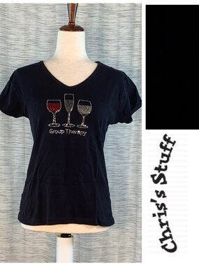 Chris’s Stuff black “Group Therapy” tee shirt.